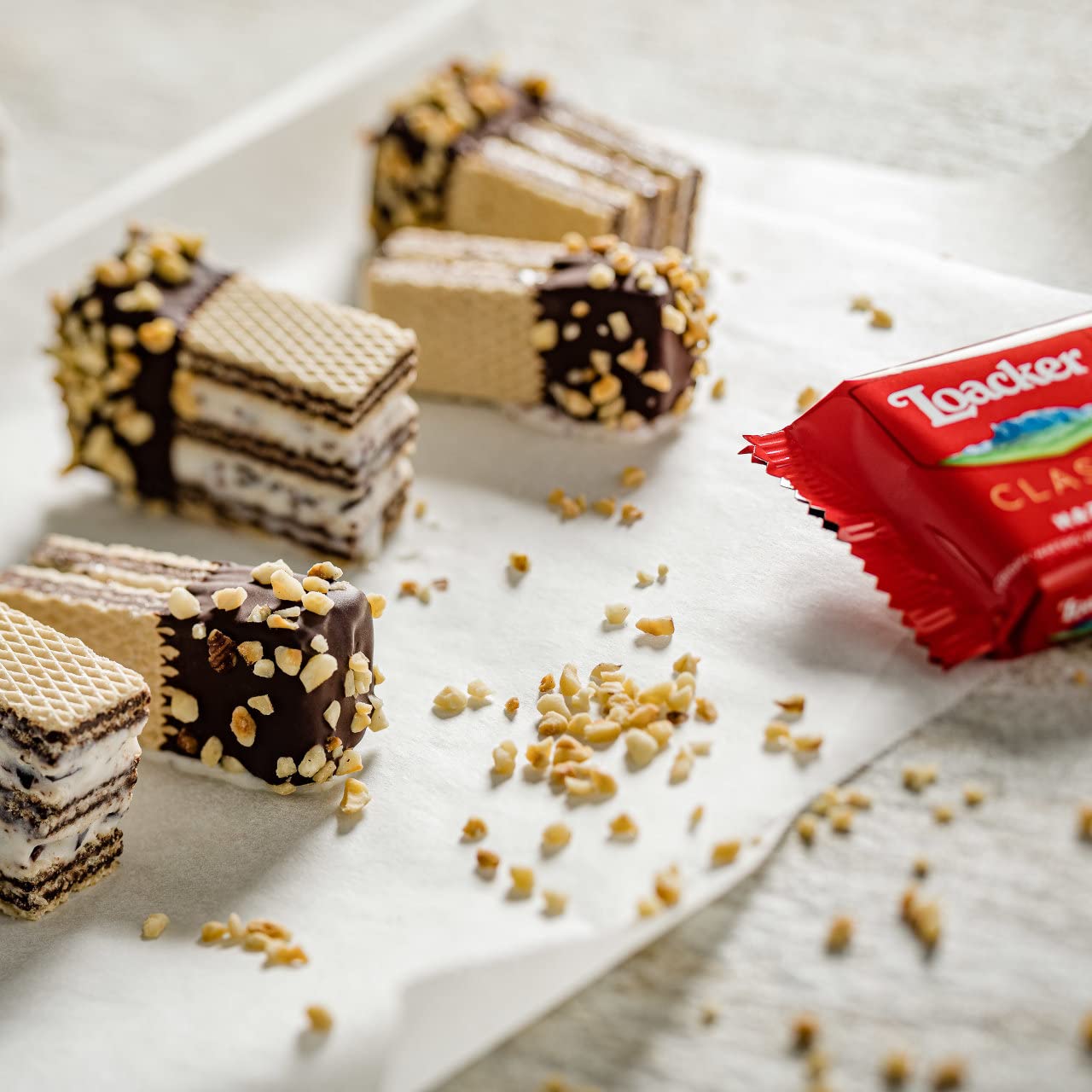 Loacker Premium Hazelnut Wafer Cookies| Multipack of 12 snacks | Crispy wafer fingers with creme-filling | 100% Italian Hazelnuts |Non GMO | No artificial flavorings, added colors or preservatives | perfect snack for lunchbox & coffee break 19.05 oz