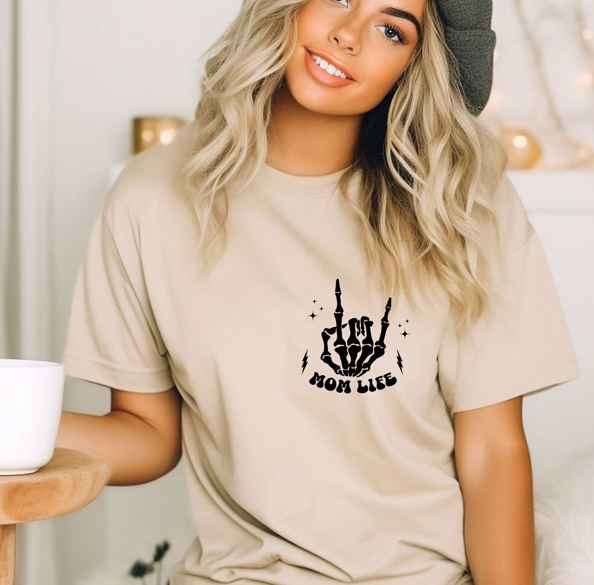 a woman wearing a t - shirt that says iron fist