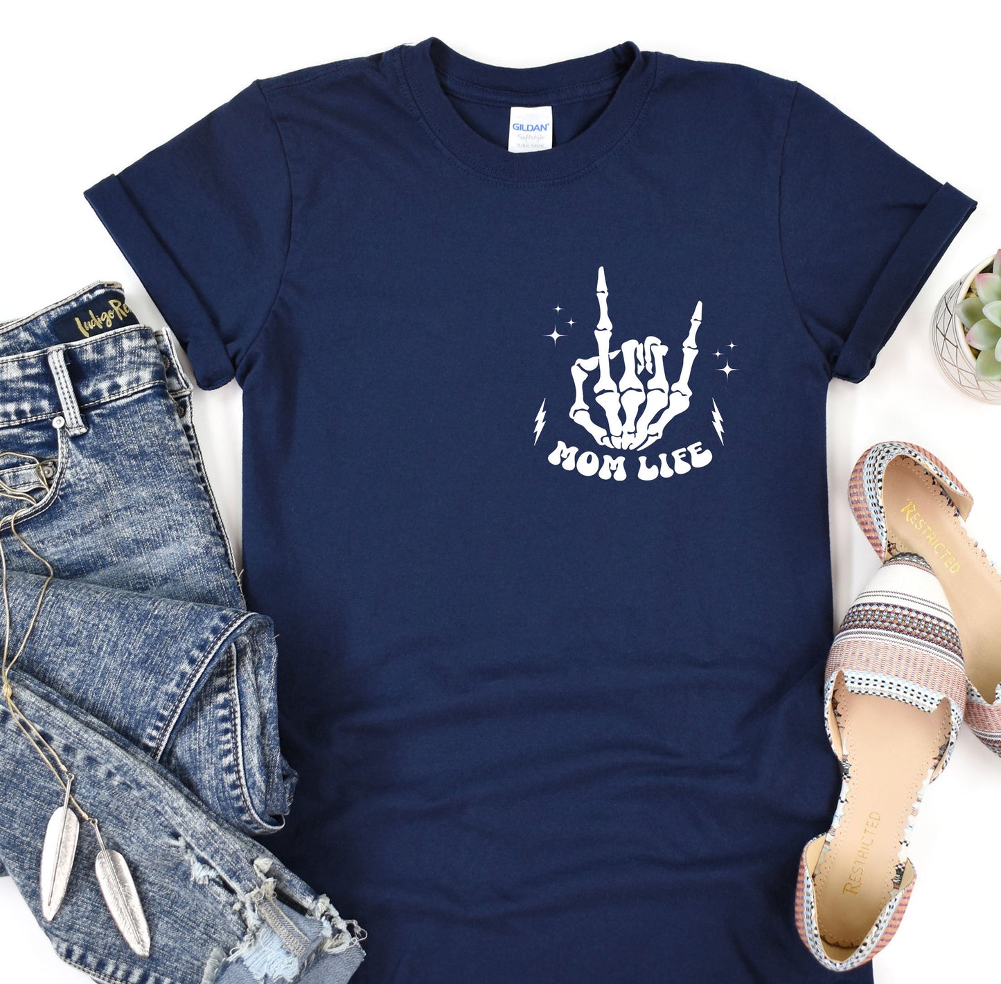 a t - shirt with the words born wild printed on it