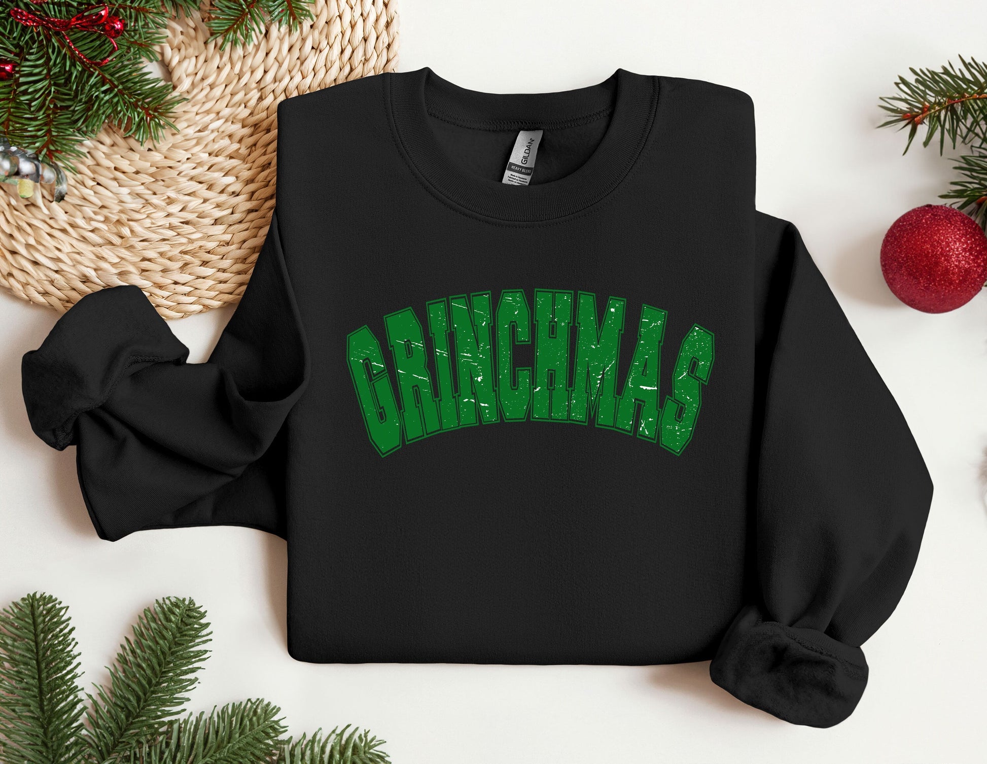 a black sweatshirt with the word grinnas printed on it