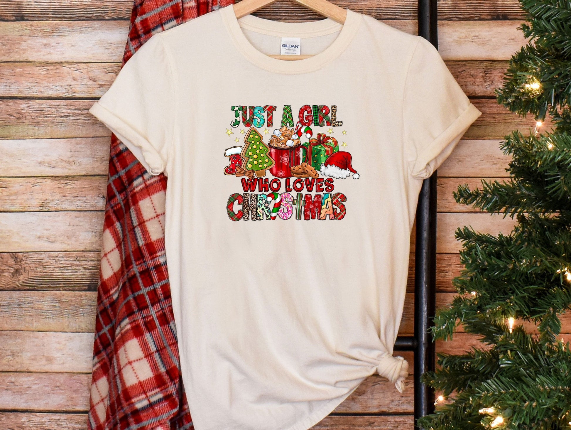a t - shirt that says, but i am who loves christmas
