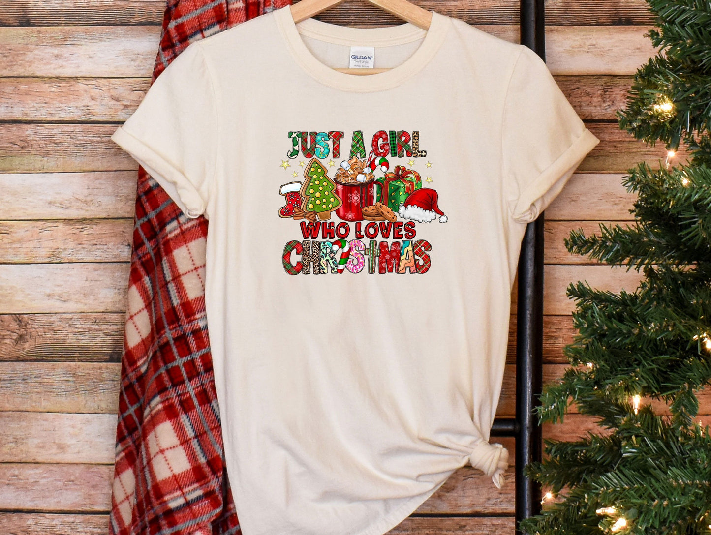 a t - shirt that says, but i am who loves christmas